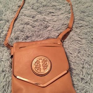 Light brown/dark tan purse.